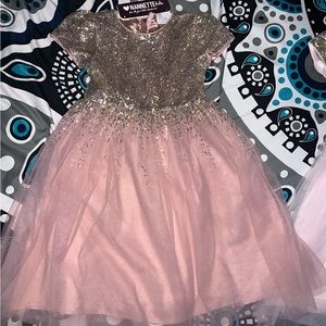 Two pink sequence dresses